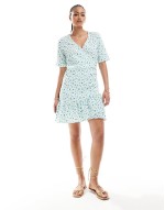 wrap front mini dress in light blue floral